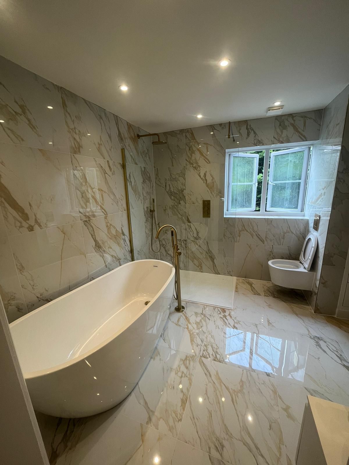 Downlights and LED mirrors in an ensuite at Bexley Park