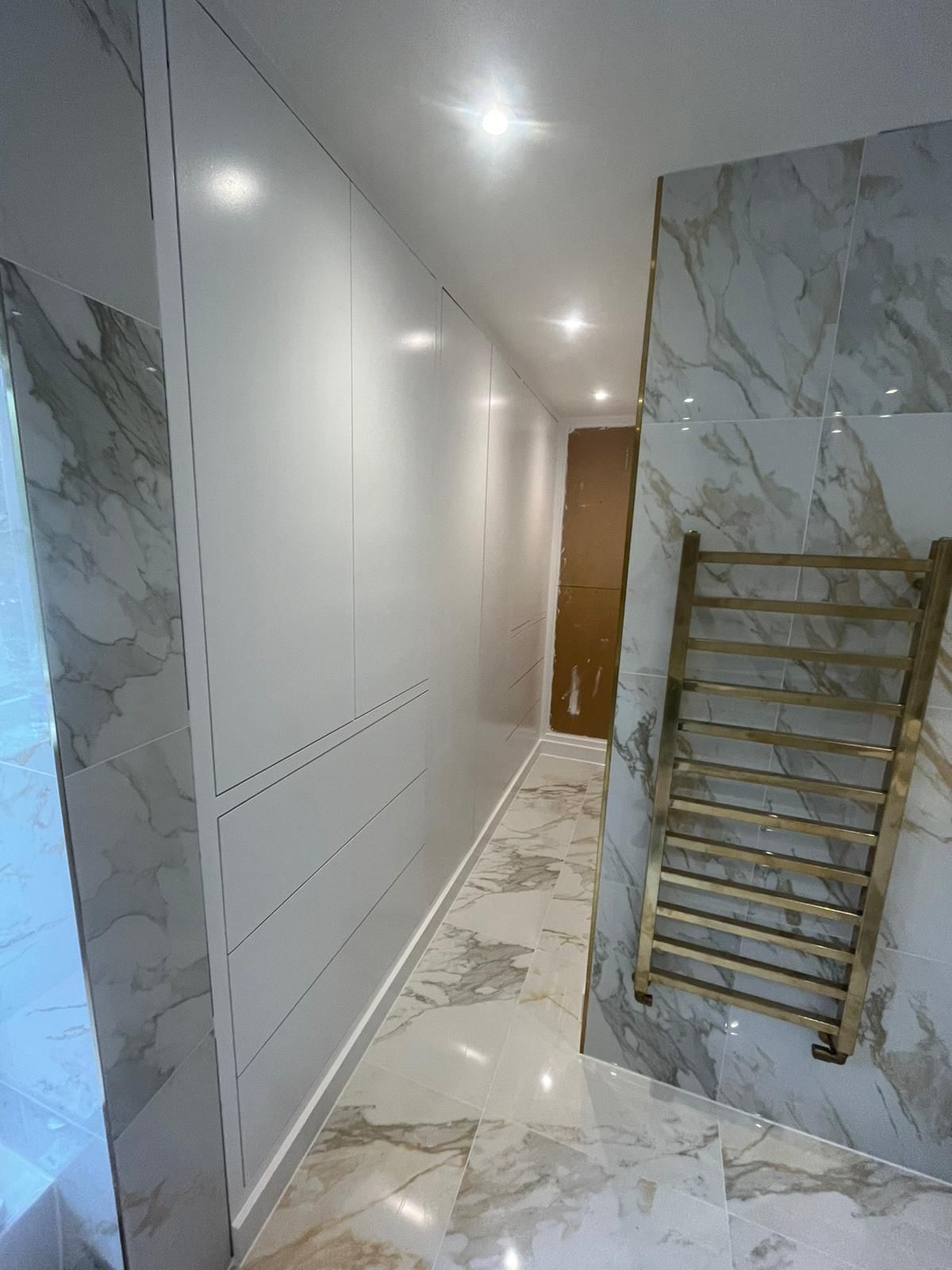 Downlights and LED mirrors in an ensuite at Bexley Park