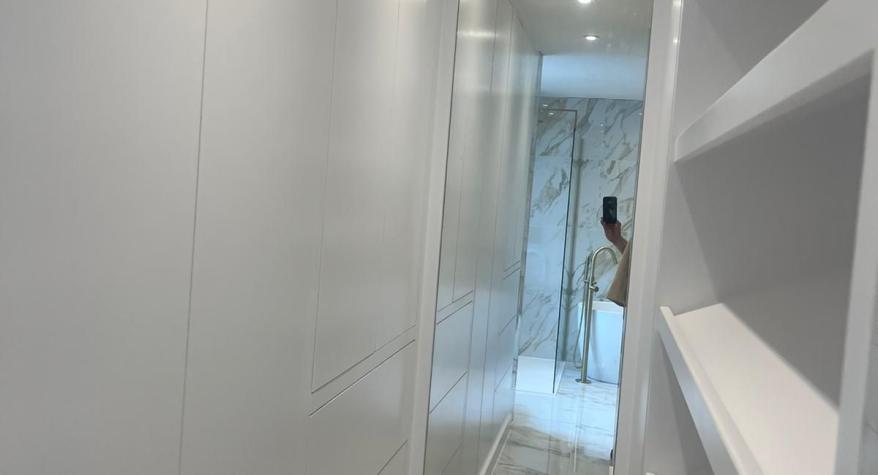 Downlights and LED mirrors in an ensuite at Bexley Park