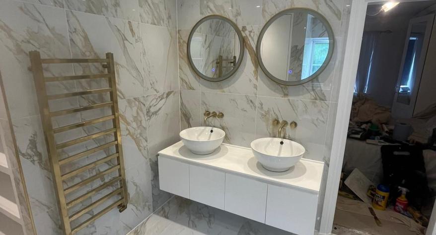 Downlights and LED mirrors in an ensuite at Bexley Park